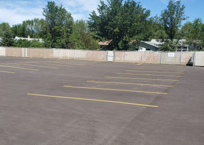 Asphalt parking lot with yellow marking